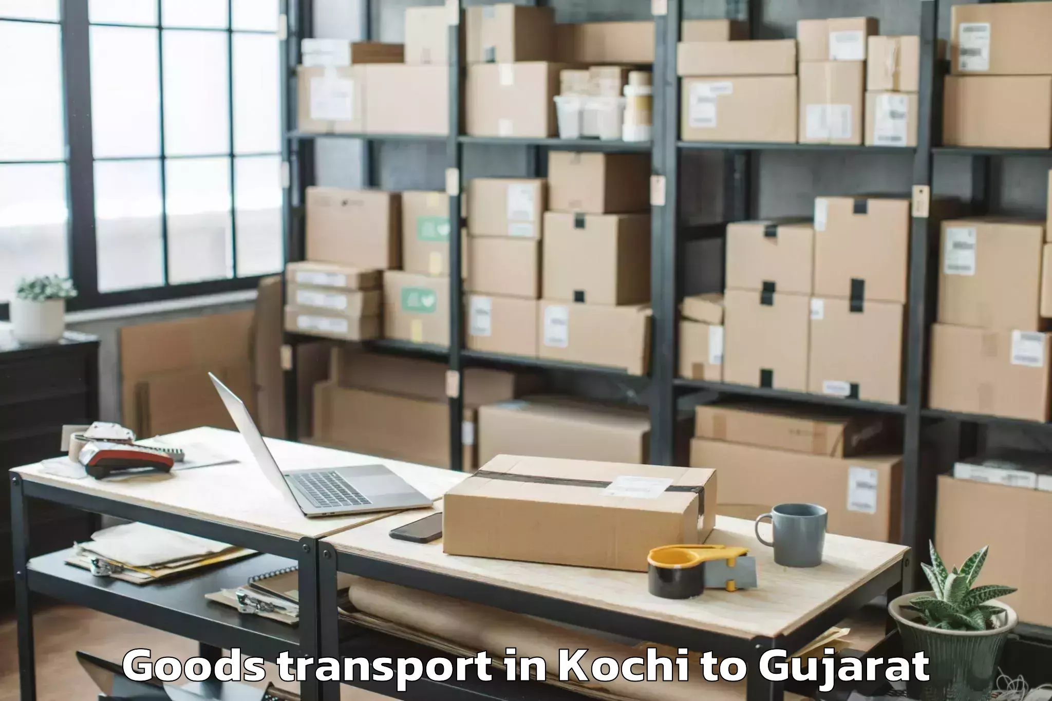 Book Your Kochi to Marwadi University Rajkot Goods Transport Today